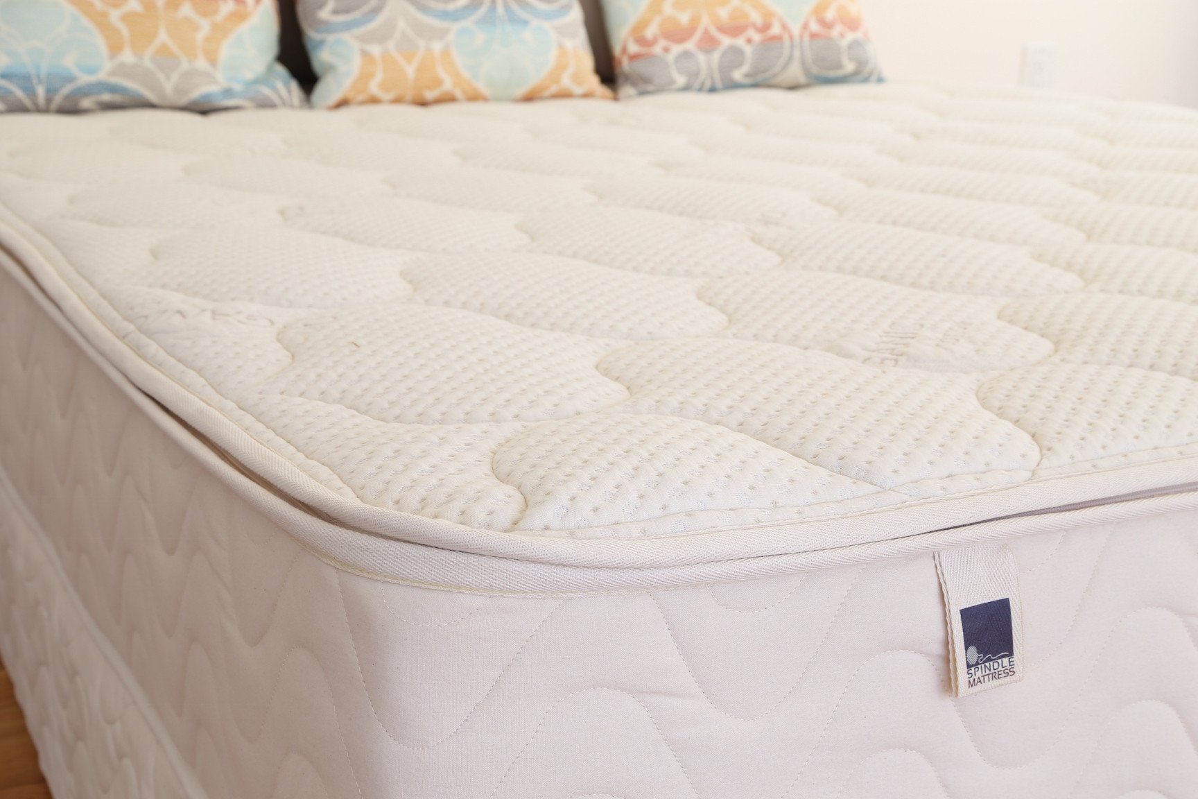 The Spindle latex core (all-latex) mattress comes with a zippered cover so that you can access and switch around the latex layers to get different firmnesses. 